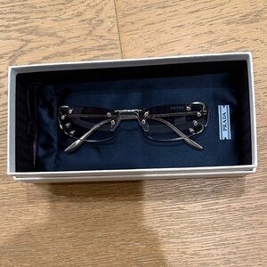 Prada Women Glasses in Black and Silver